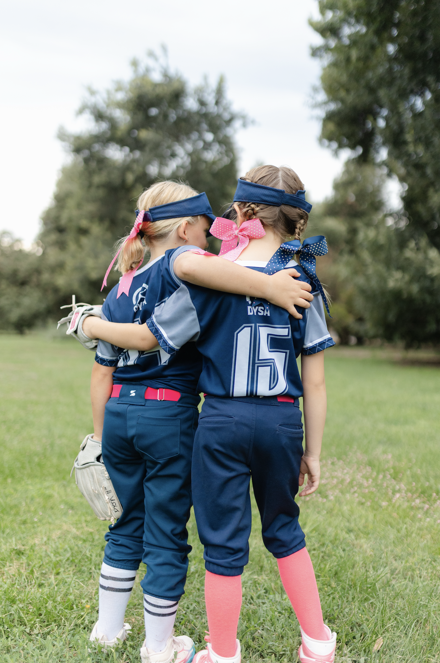 DYSA softball girls celebrating — community sports in Davis